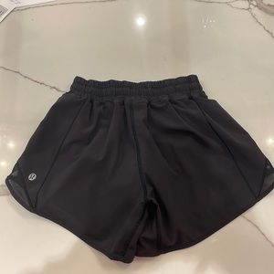 Lululemon Hotty Hot, size 2 tall, lined. Black. Perfect condition!